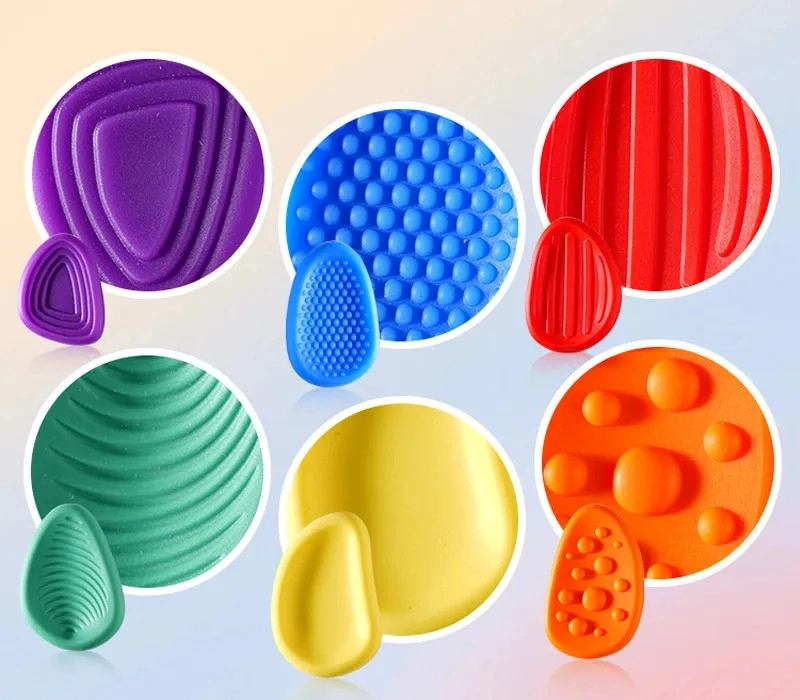 Silicone Sensory Stone duplicate of circular texture close ups image showing six different tactile surface patterns