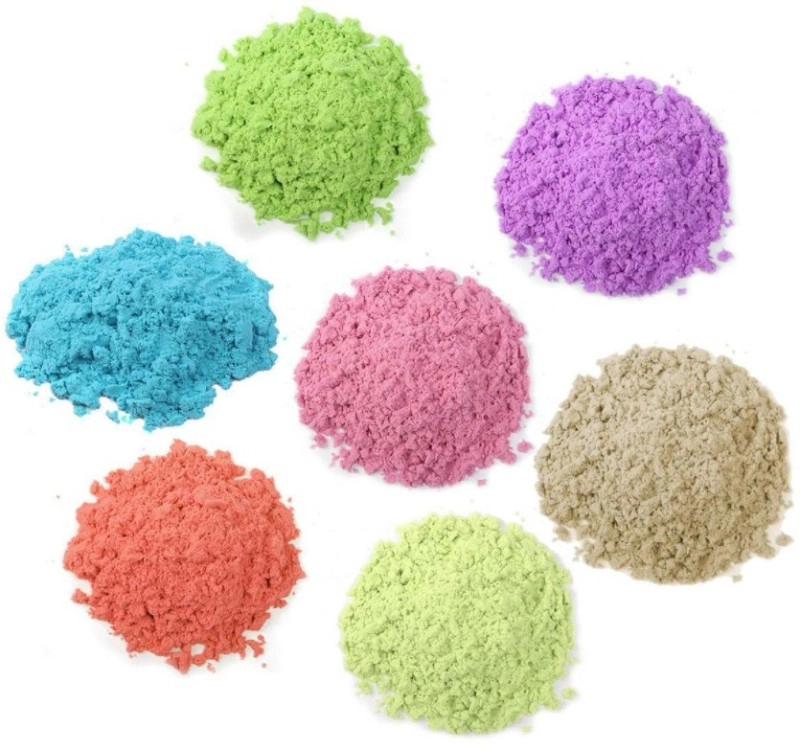 Siete montones sueltos de Arena Sensorial del Espacio en verde, morado, azul, rosa, marrón, naranja y lima mostrando la gama de colores