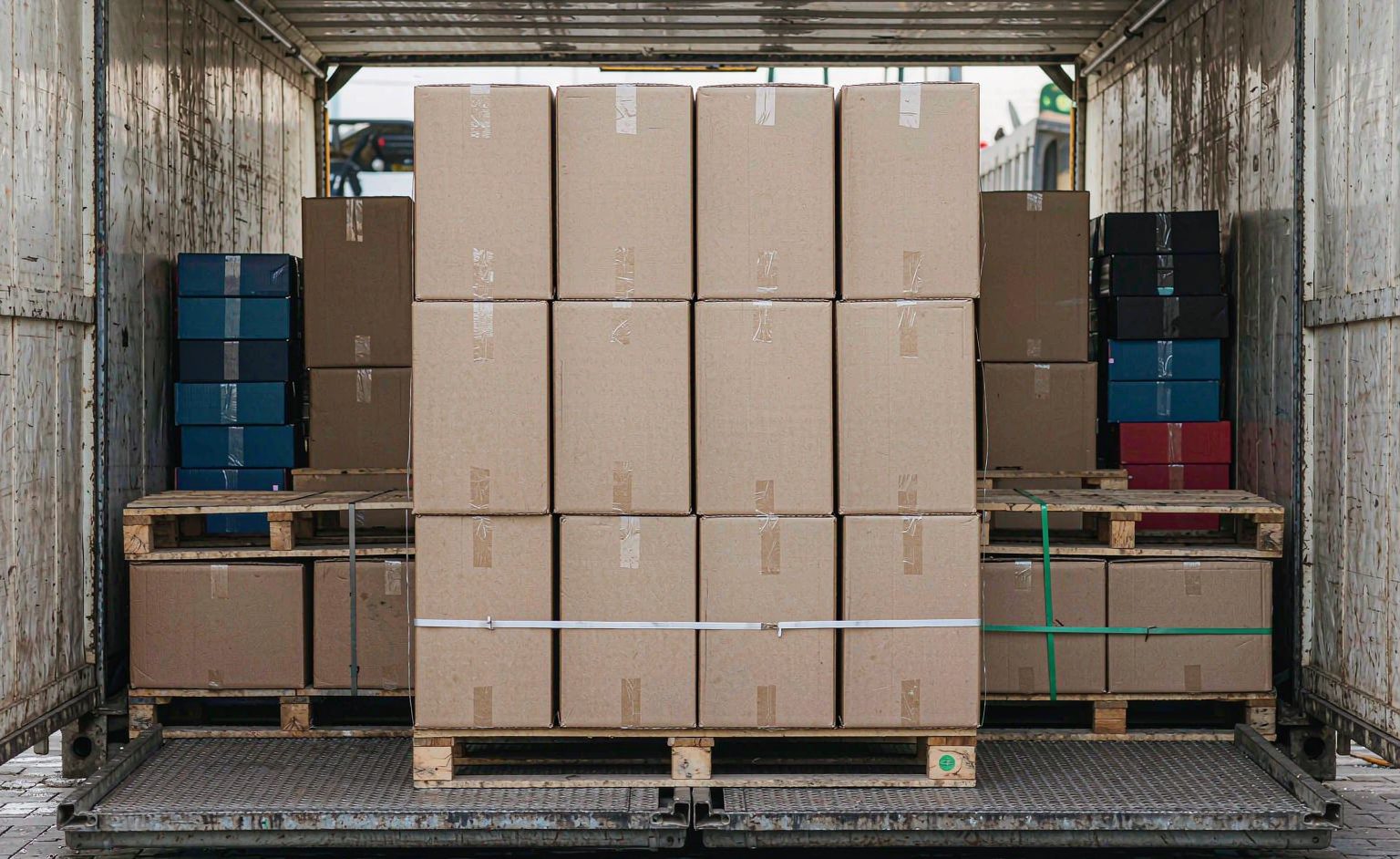 Palletized cartons stacked inside a truck container for mixed toy orders