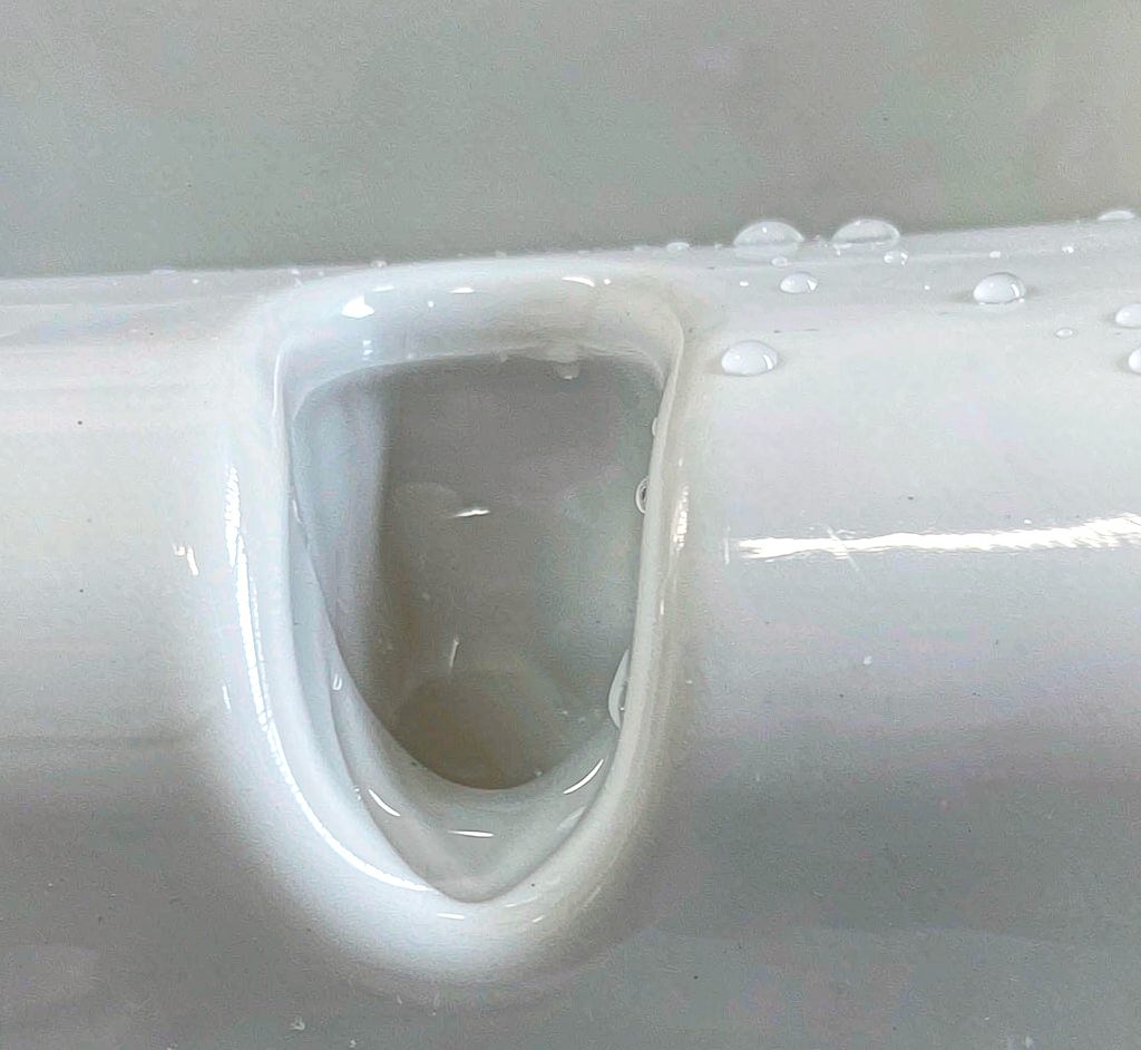 Hole-Free Bath Toy Design Macro of a seamless hole-free molded bath toy surface with water droplets