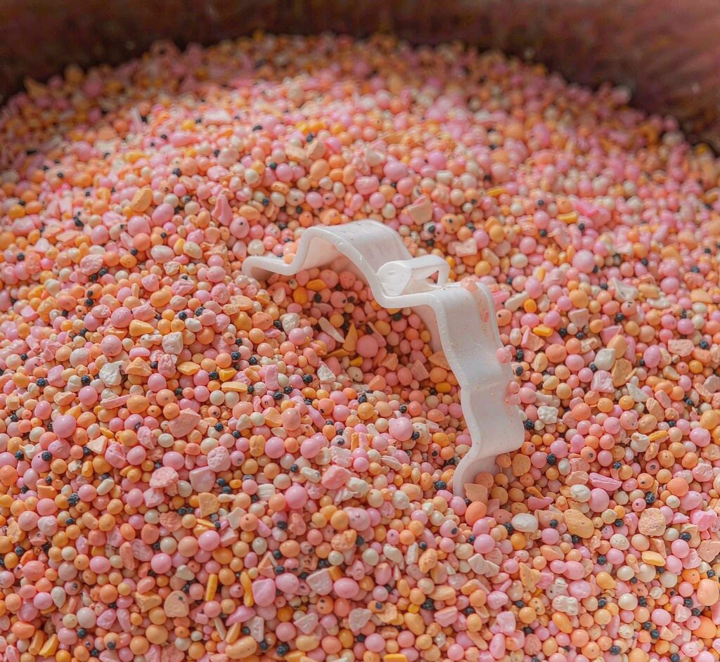 Foam Bead Filler Material Macro of colorful foam beads used as lightweight filler in play sand and dough products